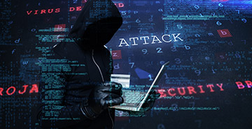 A cybersecurity concept image with a laptop and credit card.